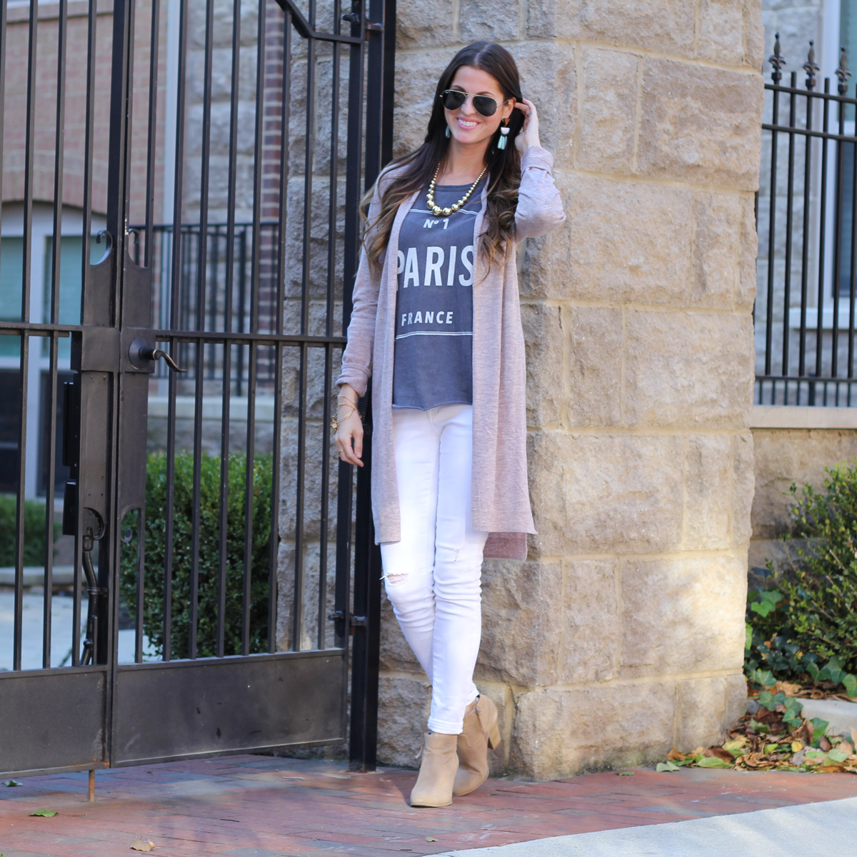 Long cardigan and paris graphic top and white skinny jeans