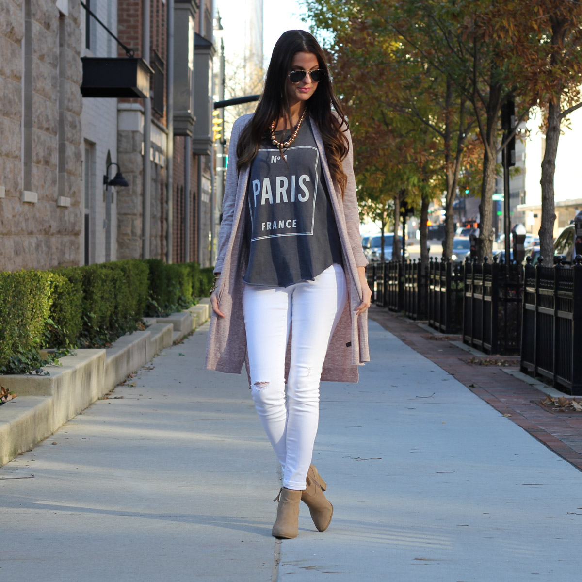 Long cardigan and Paris graphic top and white skinny jeans