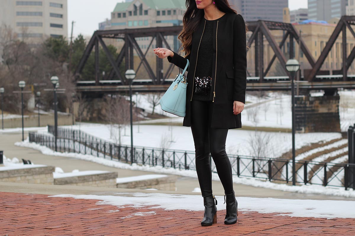 Sequin top and leather leggings and Henri Bendel purse