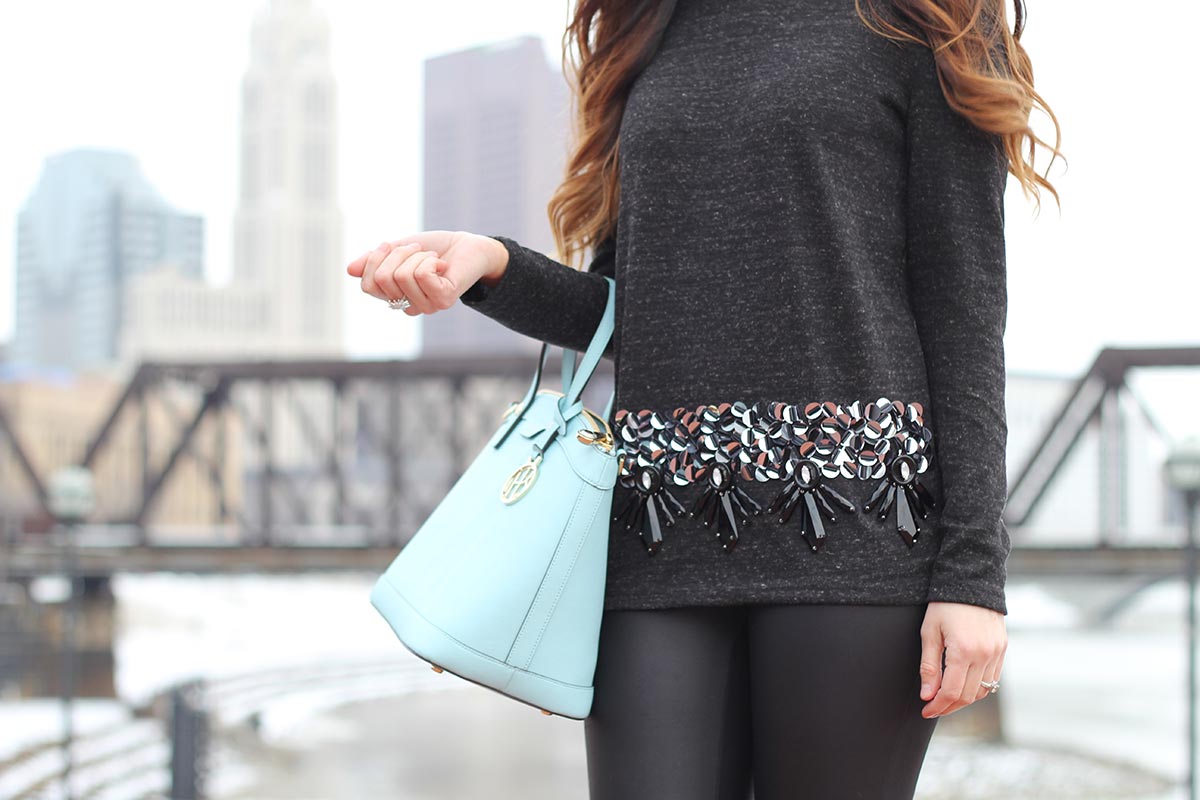 Sequin top and leather leggings and Henri Bendel purse