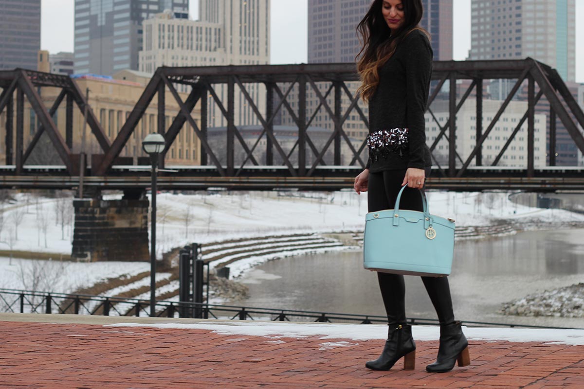 Sequin top and leather leggings and Henri Bendel purse