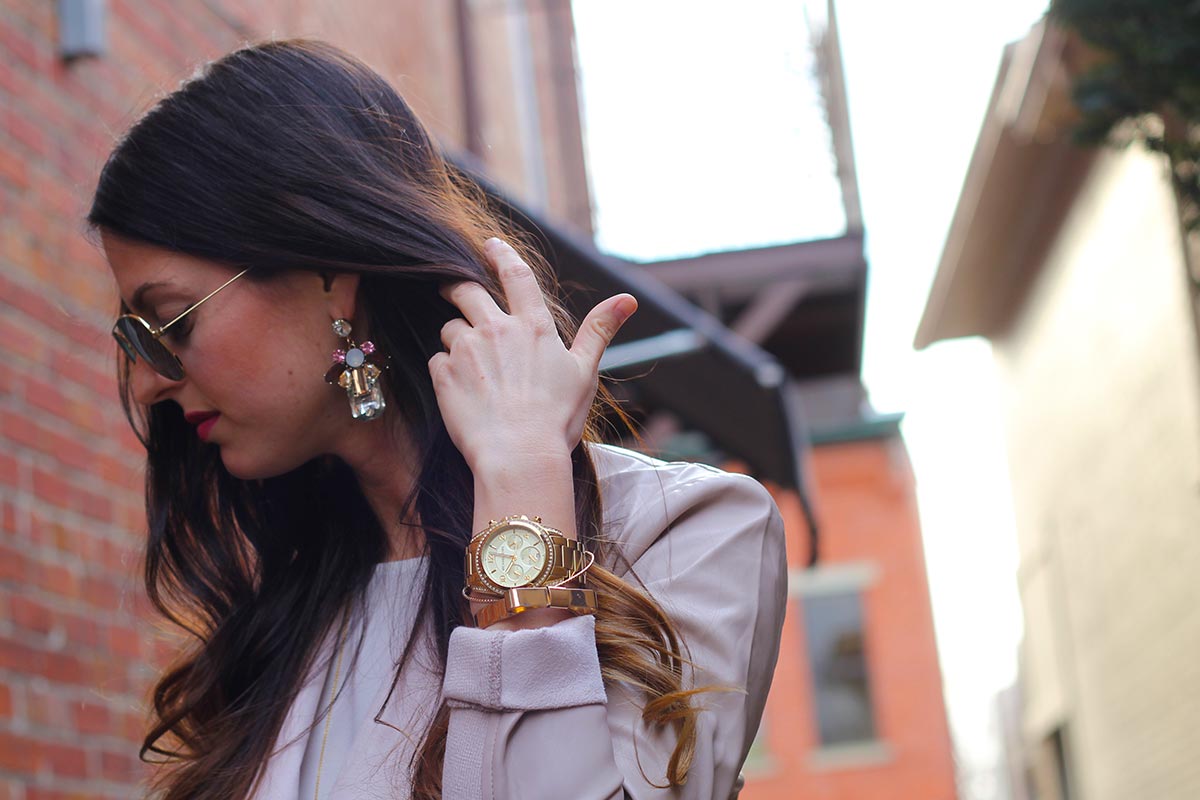 Leather jacket and Marc Jacobs watch and statement earrings