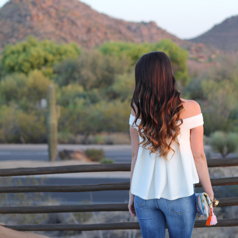 White Off-the-Shoulder Top and Colorful Clutch