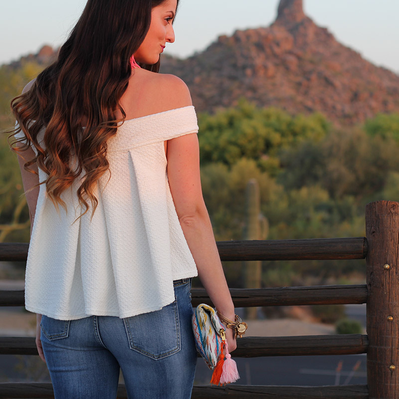 White Off-the-Shoulder Top and Colorful Clutch